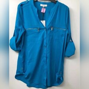 Calvin Klein loosing fitting blue top size small NWT